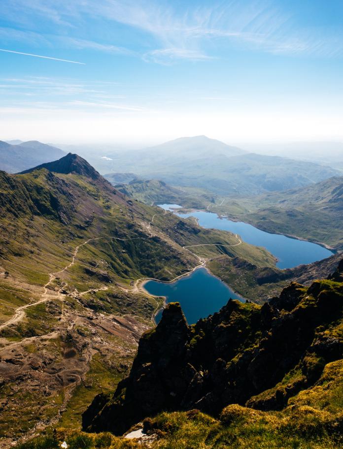 Photo taken on a bright day with views from Snowdon of mountains and lakes.