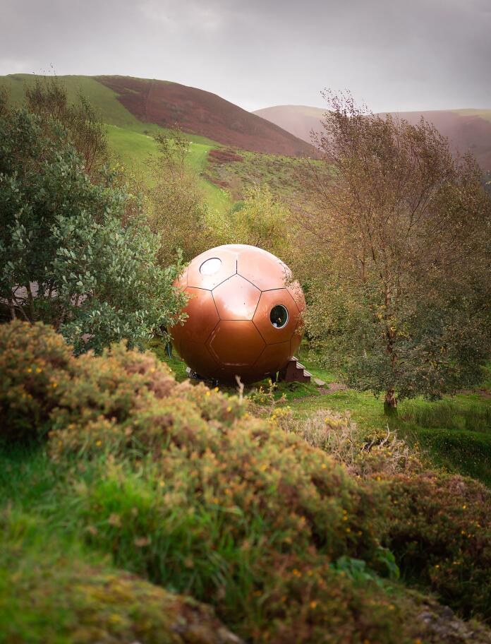 Glamping pod and surrounding countryside.