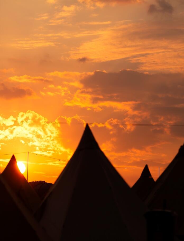 Sunset over the festival tents,