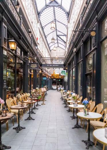 shopping arcade and tables and chairs.