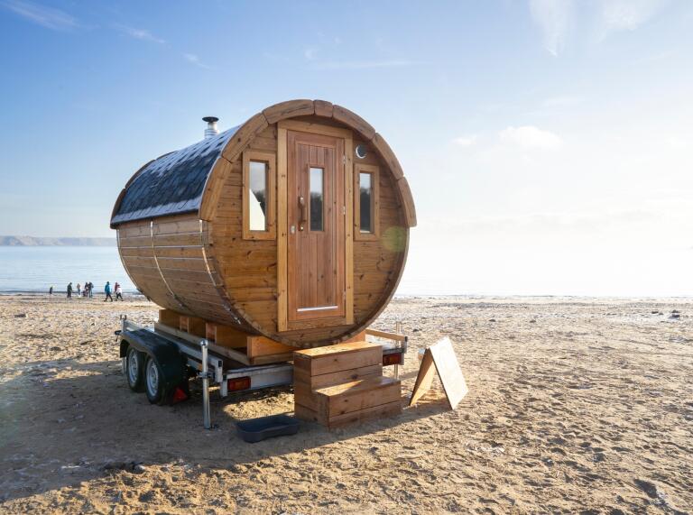 Portable sauna on beach.