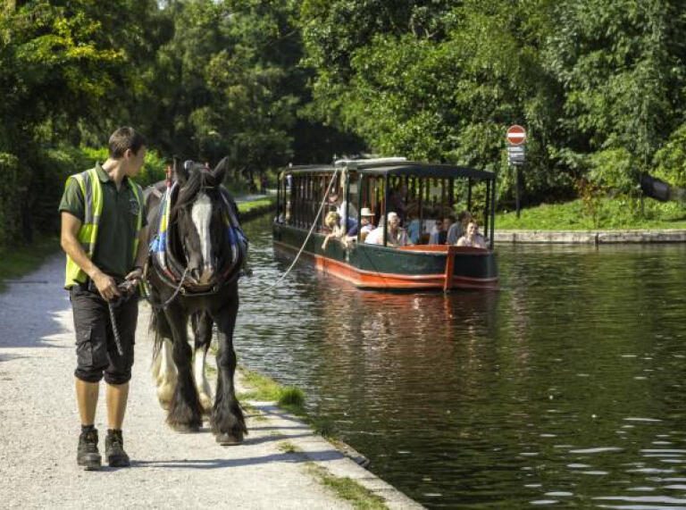 A horse drawn boat on the canal at Llangollen.