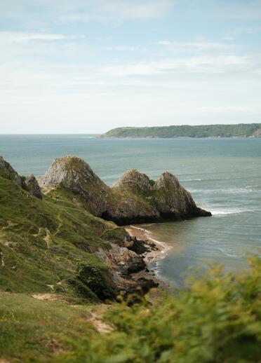 jagged cliffs and sea.