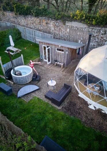 The Little Retreat glamping pod and hot tub viewed from above.