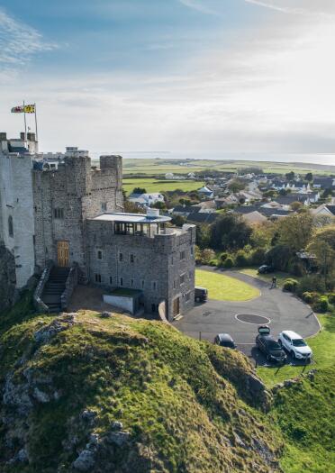 aerial view of castle and surrounding countryside.