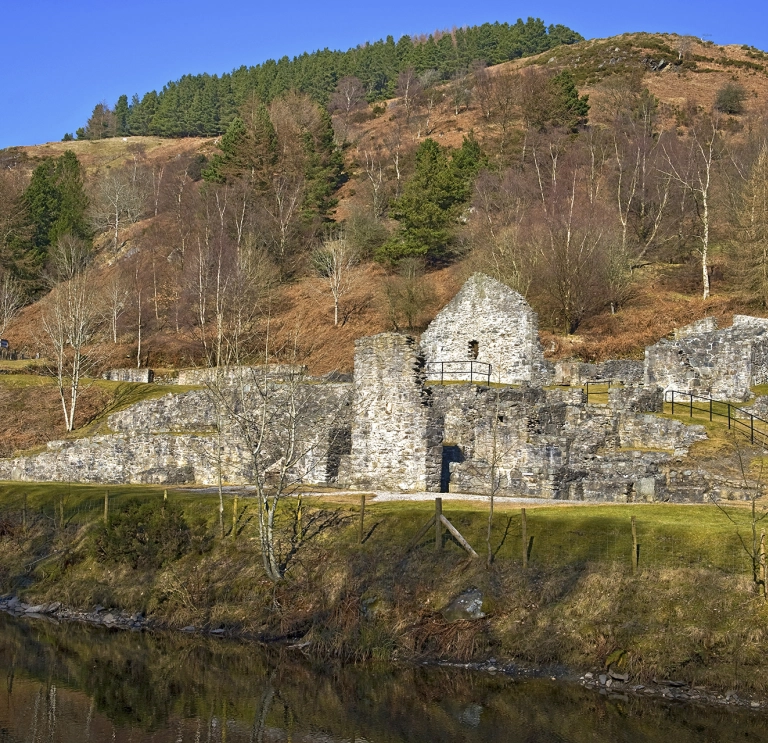 Wide view of mine buildings from south west Bryntail Lead Mine.