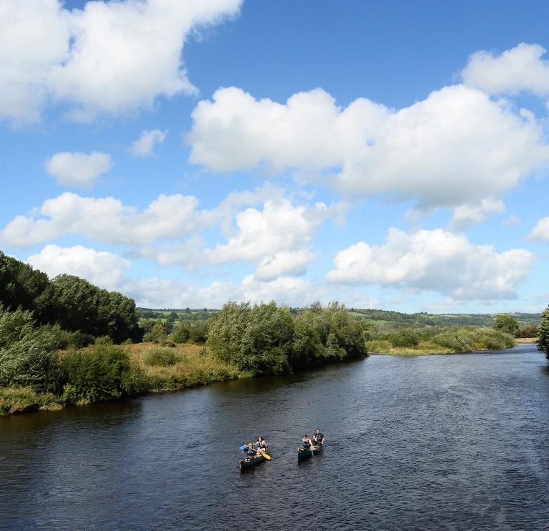 Two canoes on the River Wye.