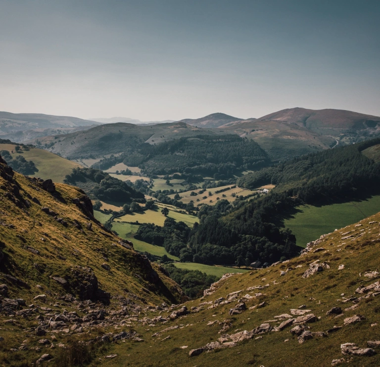 Rolling green hills and mountains.