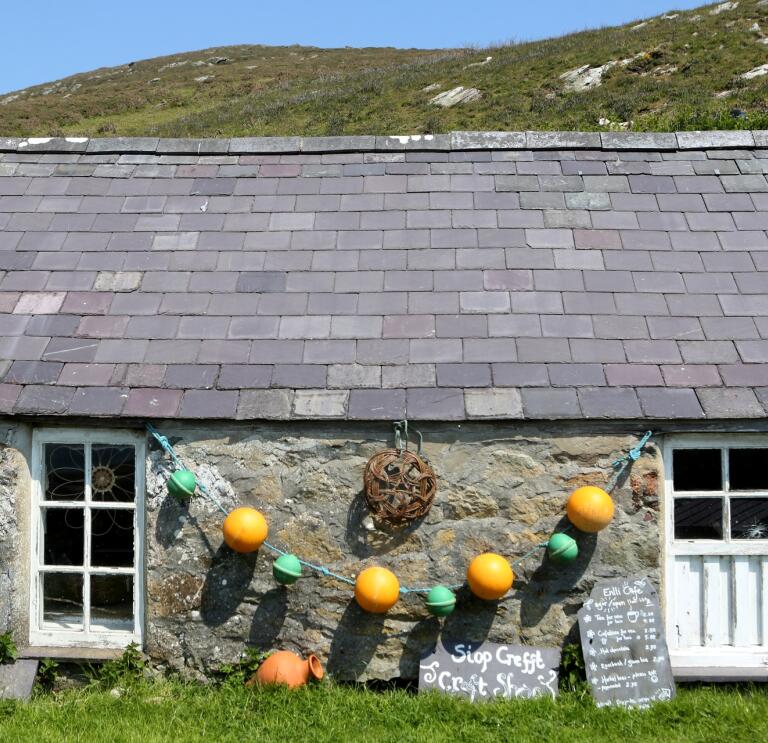 A buoy-strewn and characterful cottage on Bardsey Island.