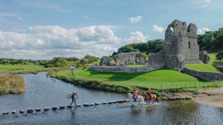 Horses crossing by Ogmore Castle