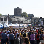 crowd in busy outdoor food festival.