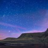 Dark skies image of Bannau, Sir Gaer and Fan Brycheiniog from Llyn y Fan Fach.