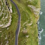 Aerial shot of car on road on the Great Orme.