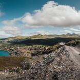 Quarry Kart at Zip World against the backdrop of mountains and the blue reservoir