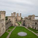 Inner courtyard of castle with lawn.